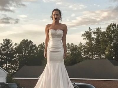 I Stepped Outside One Morning and Saw a Woman in a Wedding Dress on My Husband’s Car Roof